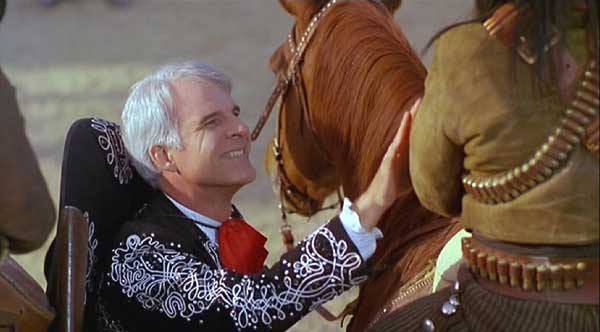 Three Amigos: Lucky tries to appease Jefe as the reality of his situation dawns.