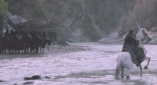 Lord of the Rings: The Fellowship of the Ring: Arwen challenges the black riders to cross the river and take Frodo.