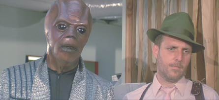 The Adventures of Buckaroo Banzai Across the 8th Dimension: Black Lectroid John Parker (Carl Lumbly) and Blue Blazer regular Pinky Carruthers (Billy Vera).