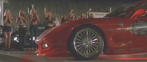 The Fast and the Furious: Dominic's Mazda RX7 pulling up to the line.