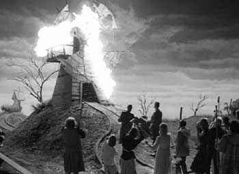 Frankenweenie: The neighbors stare in horror at the burning windmill with Victor trapped inside.