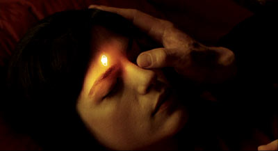 Hellboy: Grigori prompts Liz to self-combust.
