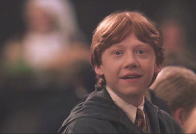 Harry Potter and the Chamber of Secrets: Ron seems pretty happy to see Hermione out of the hospital, don't you think?