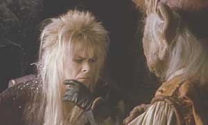Labyrinth: Jareth examines the bracelet, a present from Sarah, and questions Hoggle's loyalty.