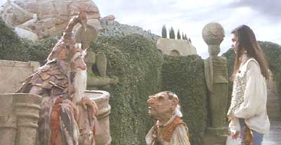 Labyrinth: Sarah and Hoggle consult the Wiseman (and his talking hat) for directions.