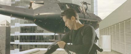 The Matrix: I've always loved this scene because it's so unexpected—Neo is strapped to a crashing helicopter, and his response is not to unclip the cable ASAP, but to wrap it around his arm!