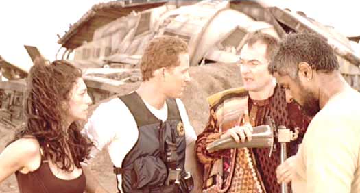 Pitch Black: Johns warns Shazza, Paris (Lewis Fitz-Gerald) and Zeke (John Moore) to be on the lookout for the escaped prisoner.