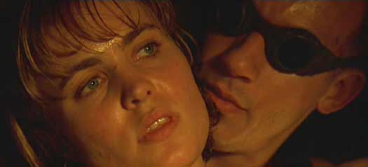 Pitch Black: Carolyn seems disturbed when Riddick invades her space to give her Johns' full story. One wonders why…