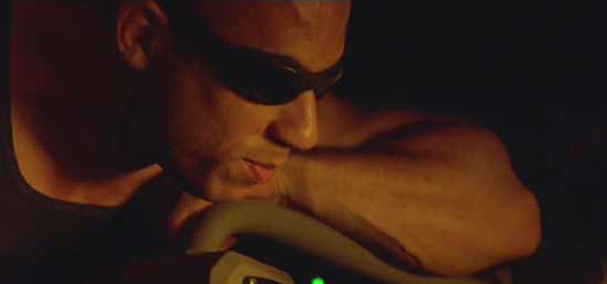 Pitch Black: Riddick can tell he's getting to Carolyn; he savors the moment.