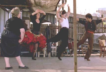 Strictly Ballroom: Grandma (Armonia Benedito), Fran, Scott and dad (Antonio Vargas) dance the night away.