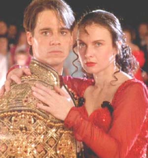 Strictly Ballroom: The dance Federation President and his cronies manage to cut the music and disqualify Scott and Fran.