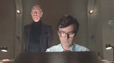 Strange Brew: Brewmeister Smith contemplates his evil plan with lackey Henry Green (Douglas Campbell).