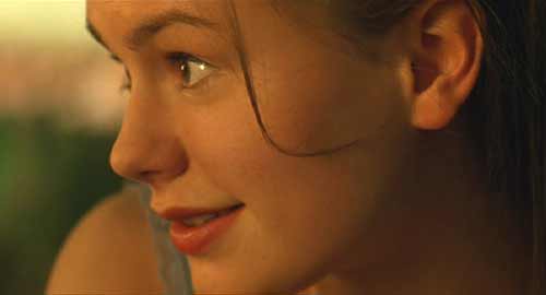 X-men: Marie (Rogue) smiling at her friend, moments before she discovers her mutant power.