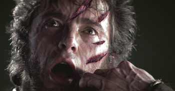 X-men: His sacrifice works - as Marie drains him of his healing powers, the injuries he's sustained worsen.