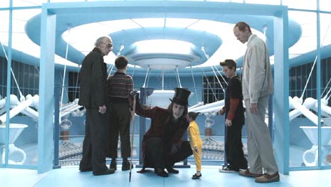 Charlie and the Chocolate Factory: An Ooompa Loompa (Deep Roy) informs Willy Wonka that Mr. Salt and his daughter Veruca will land on about three weeks of garbage.
