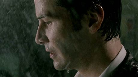 Constantine: Is Keanu going to have to stand around in the rain in all of his movies now?