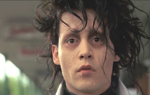 Edward Scissorhands: Edward looks forlornly after Kim at the mall.