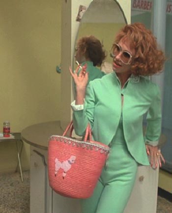 Edward Scissorhands: Joyce (Kathy Baker) demonstrates the way she'll greet customers in Edward's new salon.