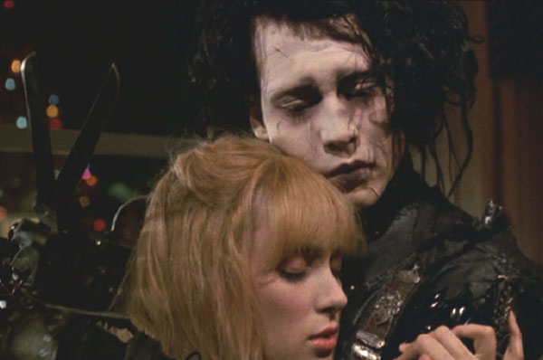 Edward Scissorhands: Kim and Edward embrace.