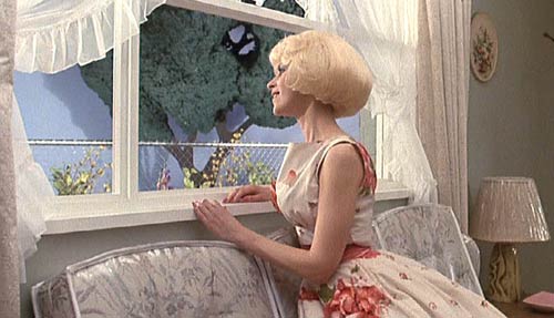 Little Shop of Horrors (1986): Audrey dreams of a perfect little house in the suburbs.